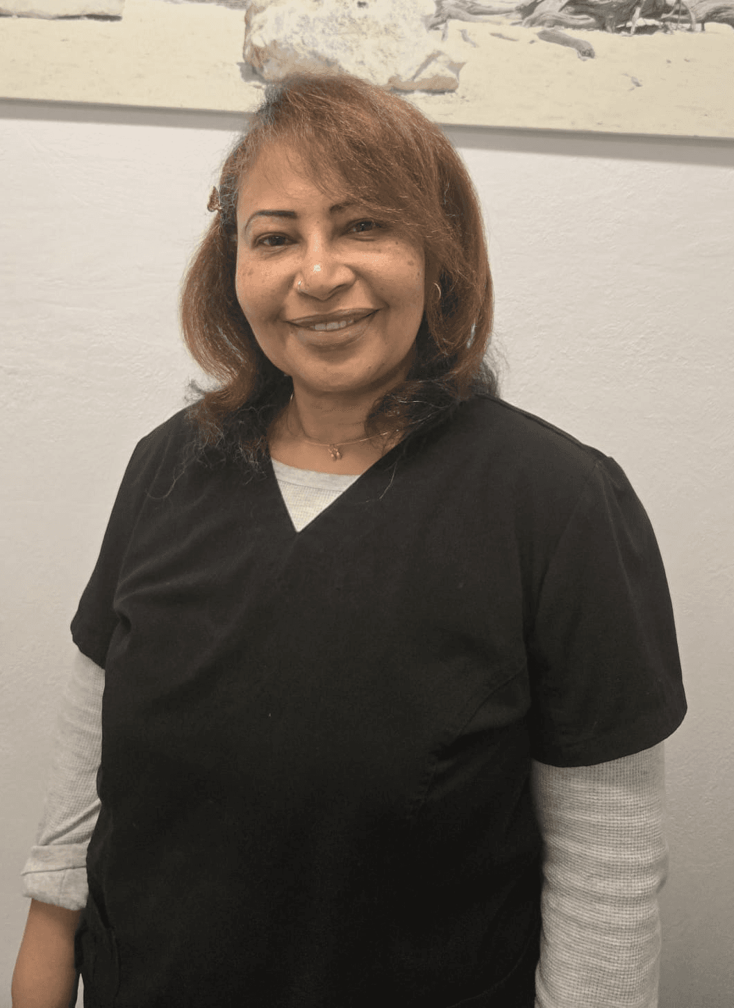 Portrait of Dalia Quinones, a professional esthetician and masseuse
